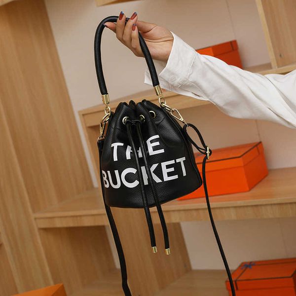 handbag 2023 fashion women's bag leather quality handbag fashionable shoulder female fashion portable bucket niche printed letter messe
handbag 2023 fashion women's bag leather quality handbag fashionable shoulder female fashion portable bucket niche printed letter messe