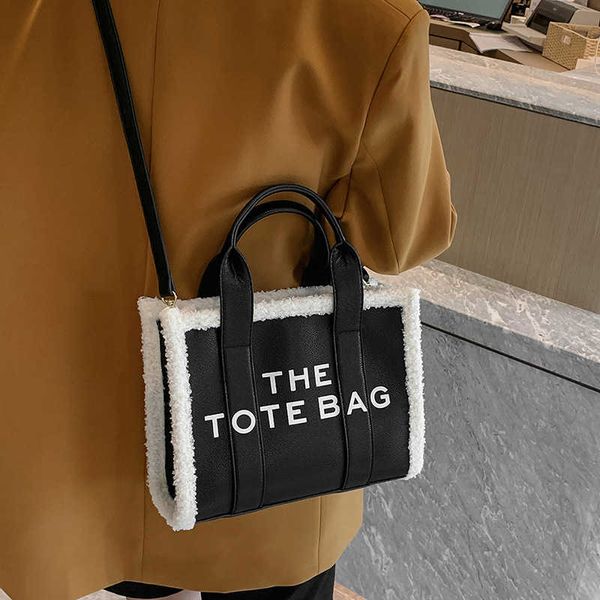 handbag 2023 hand fashionable new shoulder autumn fashion portable tote bag niche printed letters one shoulder messenger bag
handbag 2023 hand fashionable new shoulder autumn fashion portable tote bag niche printed letters one shoulder messenger bag
