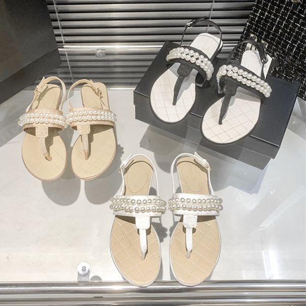 2023 luxury designer pearl thong sandals women's beach shoes calf leather classic hardware buckle c pearl heel fashion platform slipper, Black
2023 luxury designer pearl thong sandals women's beach shoes calf leather classic hardware buckle c pearl heel fashion platform slipper, Black