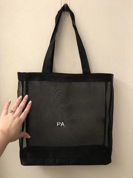c classic white logo mesh shopping bag luxury pattern travel wash bag women storage mesh case
c classic white logo mesh shopping bag luxury pattern travel wash bag women storage mesh case