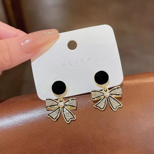 small design sense charm black bow earrings hong kong style cool style pearl earrings classic hepburn style earrings, Golden
small design sense charm black bow earrings hong kong style cool style pearl earrings classic hepburn style earrings, Golden