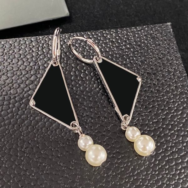 brand triangle pearl studs letter silver stamps earrings women party hoops studs eardrops with box birthday gift anniversary, Golden;silver
brand triangle pearl studs letter silver stamps earrings women party hoops studs eardrops with box birthday gift anniversary, Golden;silver