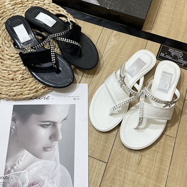 2023 rhinestone embellished thong sandal lambskin flip flops slip on flat logo leather mule slides diamond star buckle summer shoes beach in, Black
2023 rhinestone embellished thong sandal lambskin flip flops slip on flat logo leather mule slides diamond star buckle summer shoes beach in, Black