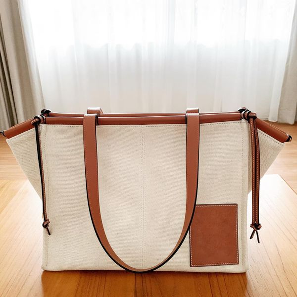 weekend classic beach handbags lady brown bags high capacity shopping tote loeve bag designer fashion shoulder canvas pochette womens retro 
weekend classic beach handbags lady brown bags high capacity shopping tote loeve bag designer fashion shoulder canvas pochette womens retro