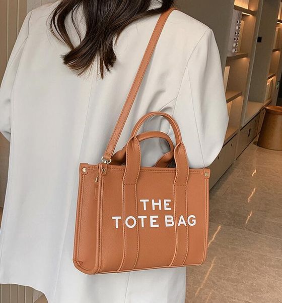 luxury the tote bag designer women mini large pu leather crossbody shoulder handbags with strap black pink totes bags handbag marc m00185, Black;red
luxury the tote bag designer women mini large pu leather crossbody shoulder handbags with strap black pink totes bags handbag marc m00185, Black;red
