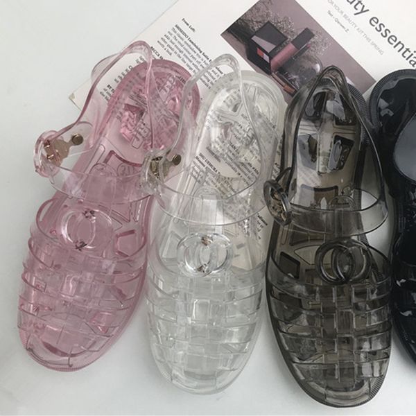 2023 summer designer sandal womens black white clear roman sandals classic rubber slippers jelly transparent slipper beach flat mule alphabe
2023 summer designer sandal womens black white clear roman sandals classic rubber slippers jelly transparent slipper beach flat mule alphabe
