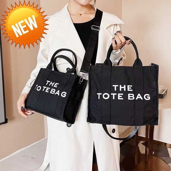 2023 traveler the tote bags canvas bag suede flurry famous designer cool practical marc large capacity plain cross body shoulder handbags3
2023 traveler the tote bags canvas bag suede flurry famous designer cool practical marc large capacity plain cross body shoulder handbags3