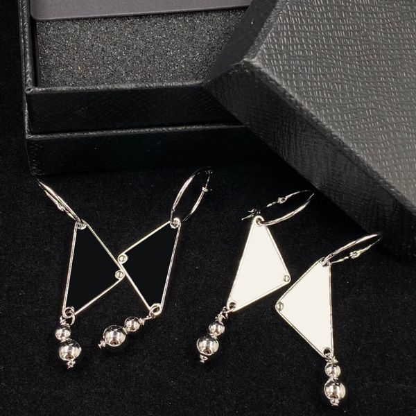 delicate triangular long studs pendant earrings designer for women triangle hoop earrings with box anniversary, Golden;silver
delicate triangular long studs pendant earrings designer for women triangle hoop earrings with box anniversary, Golden;silver