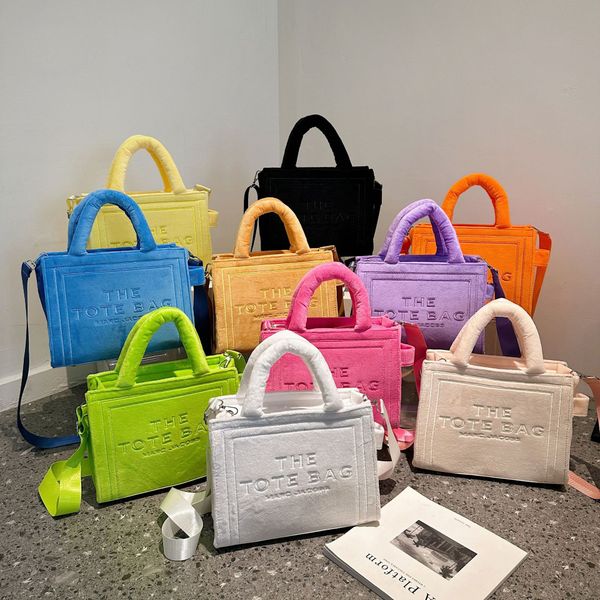 designer the tote bag women luxury clutch bags pu leather handbags lady messenger crossbody shoulder bag wallet lady 27cm 00237
designer the tote bag women luxury clutch bags pu leather handbags lady messenger crossbody shoulder bag wallet lady 27cm 00237