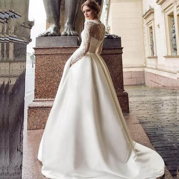 moden a line applique long sleeve wedding dress satin chaple plus size button wedding dress illusion bodice wedding gowns, White
moden a line applique long sleeve wedding dress satin chaple plus size button wedding dress illusion bodice wedding gowns, White