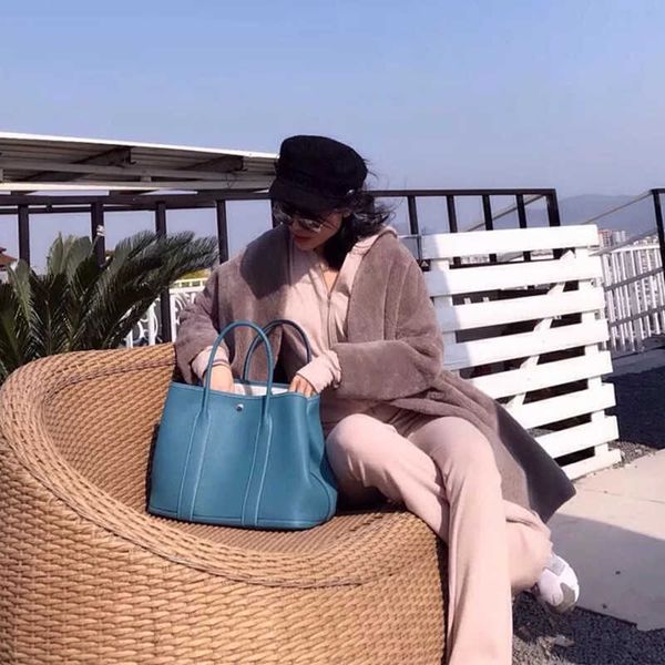 original designer galden party bag 2023 new cowhide women's bag single shoulder diagonal span simple garden portable large shopping buc
original designer galden party bag 2023 new cowhide women's bag single shoulder diagonal span simple garden portable large shopping buc