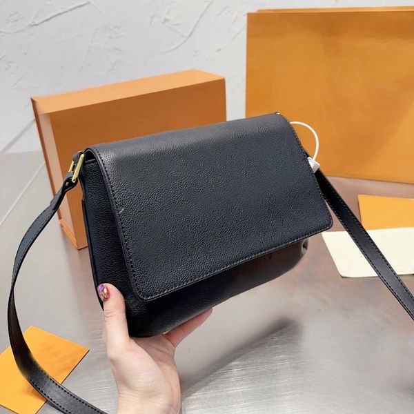 designer bag symmetrical embossed black messenger handbag long strap crossbody small square purse
designer bag symmetrical embossed black messenger handbag long strap crossbody small square purse