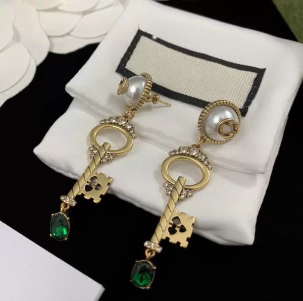 new fashion pearl letter dangle designer earrings for women party jewelry gift with box, Silver
new fashion pearl letter dangle designer earrings for women party jewelry gift with box, Silver