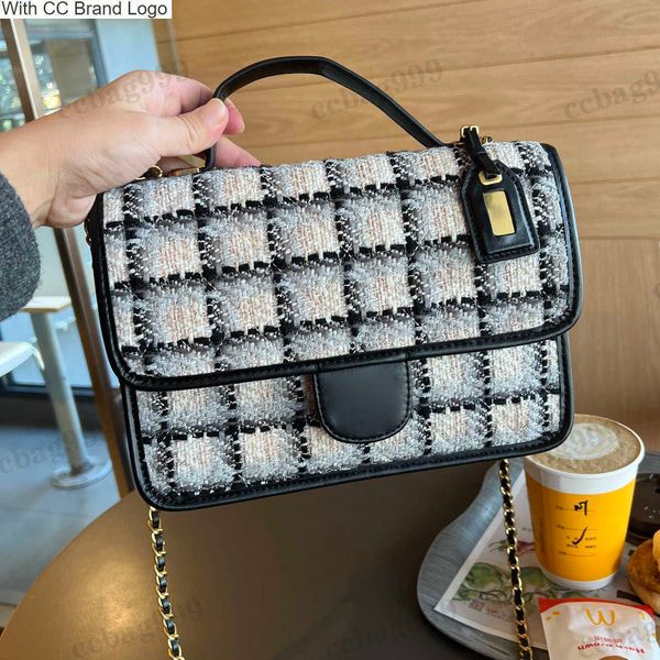 cc brand cross body 22fall french tweed postman envelope bag with handle classic black white woolen quilted matelasse gold metal chain cross
cc brand cross body 22fall french tweed postman envelope bag with handle classic black white woolen quilted matelasse gold metal chain cross