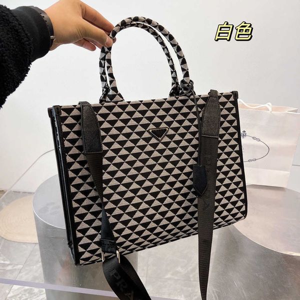 luxury fashion bag new black and white contrast tote canvas embroidery portable large capacity shopping single shoulder messenger baghigh
luxury fashion bag new black and white contrast tote canvas embroidery portable large capacity shopping single shoulder messenger baghigh