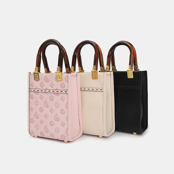 luxury fashion bag mini tote new women's small one shoulder portable diagonal cross music baghigh
luxury fashion bag mini tote new women's small one shoulder portable diagonal cross music baghigh