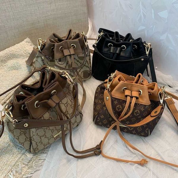 70% 2023 new shoulder bag new portable temperament women's handbag printed foreign style bucket trendyhigh
70% 2023 new shoulder bag new portable temperament women's handbag printed foreign style bucket trendyhigh