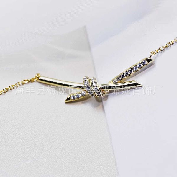 high version v gold plated mi material diamond knotted necklace t rope female 1.0 gold pendant collarbone chain original packaging, Silver
high version v gold plated mi material diamond knotted necklace t rope female 1.0 gold pendant collarbone chain original packaging, Silver