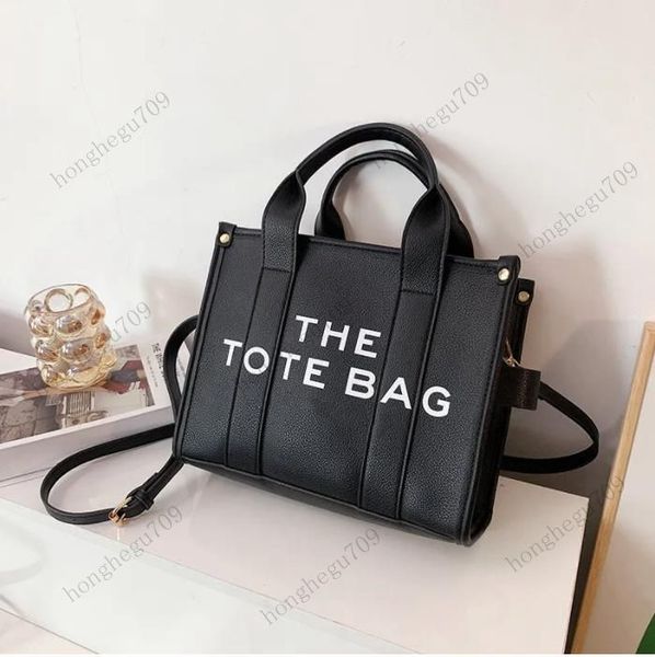 the leather tote bag marc womens handbag debossed signature branding totes bags shoulder crossbody colorblock bags canvas designer large pur
the leather tote bag marc womens handbag debossed signature branding totes bags shoulder crossbody colorblock bags canvas designer large pur