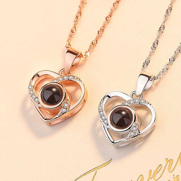 double layer heart love projection necklace fashion luxury hollowed out 100 languages i love you send my girlfriend, Silver
double layer heart love projection necklace fashion luxury hollowed out 100 languages i love you send my girlfriend, Silver
