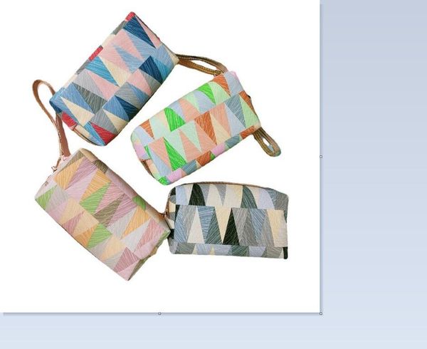 dhl50pcs stuff sacks women pvc contrasting colors geometry prints brief large capacity solid cosmetic bag mix color
dhl50pcs stuff sacks women pvc contrasting colors geometry prints brief large capacity solid cosmetic bag mix color