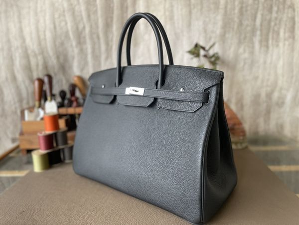 40cm man handbag customized color totes luxury bag brand purse genuine togo leather fully handmade quality wax line stitching wholesale pric
40cm man handbag customized color totes luxury bag brand purse genuine togo leather fully handmade quality wax line stitching wholesale pric
