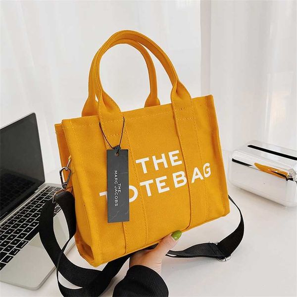 tote bag women's 2023 new fashion printed letter canvas hand shoulder messenger
tote bag women's 2023 new fashion printed letter canvas hand shoulder messenger