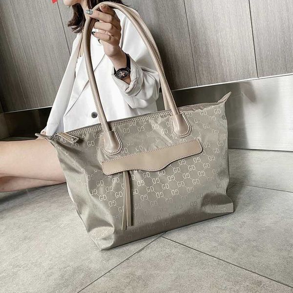 2023 fashion letters designer bags oxford women's fashionable versatile tote simple one shoulder large capacity handbag women handbags
2023 fashion letters designer bags oxford women's fashionable versatile tote simple one shoulder large capacity handbag women handbags