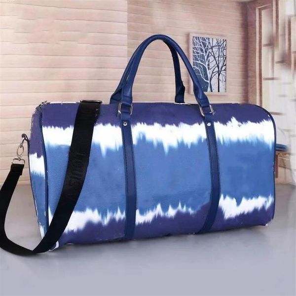 2021 50cm large capacity duffel bags women men travel bag quality shoulder carry on luggage bottom rivets with lock head hand237s
2021 50cm large capacity duffel bags women men travel bag quality shoulder carry on luggage bottom rivets with lock head hand237s