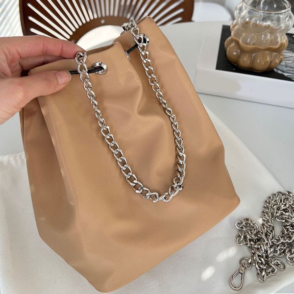 drawstring bucket bag chains handbag purse nylon totes bag shoulder women back wallet detachable chain plain triangle hardware large capacit
drawstring bucket bag chains handbag purse nylon totes bag shoulder women back wallet detachable chain plain triangle hardware large capacit