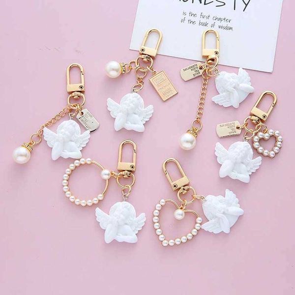 interior decorations creative retro white angel chain charms earphone case holder girl cute pearl key ring women bag ornaments accessories r
interior decorations creative retro white angel chain charms earphone case holder girl cute pearl key ring women bag ornaments accessories r