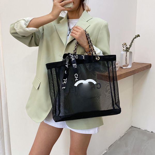 chanei mesh beach bag designer bags handbag oversized beach tote bag simplified logo with large letters shopping bags 42x34x9cm
chanei mesh beach bag designer bags handbag oversized beach tote bag simplified logo with large letters shopping bags 42x34x9cm