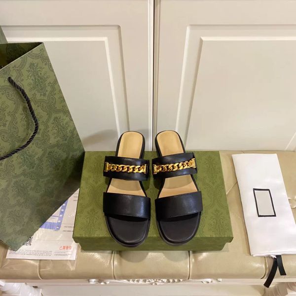 women's slippers with chain this pair is defined by a gold-toned chain crafted from smooth white leather the style is offset by a cork, Black
women's slippers with chain this pair is defined by a gold-toned chain crafted from smooth white leather the style is offset by a cork, Black