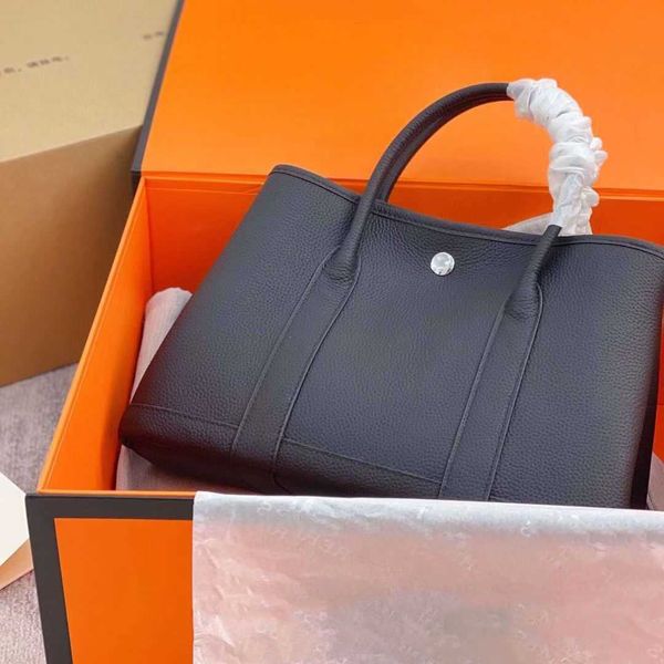 h ermes h gardens grace bag all manual wax line garden party garden togo cowhide business hand commuter women's tote with real logo
h ermes h gardens grace bag all manual wax line garden party garden togo cowhide business hand commuter women's tote with real logo