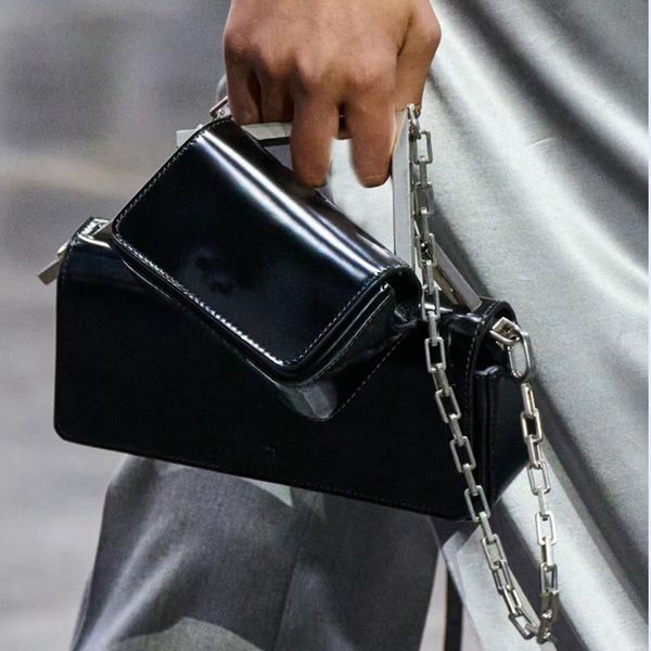 first sight small rectangular flap bag black leather mini bag embellished with a chain handle linked to an oversized metal f accessory clutc
first sight small rectangular flap bag black leather mini bag embellished with a chain handle linked to an oversized metal f accessory clutc