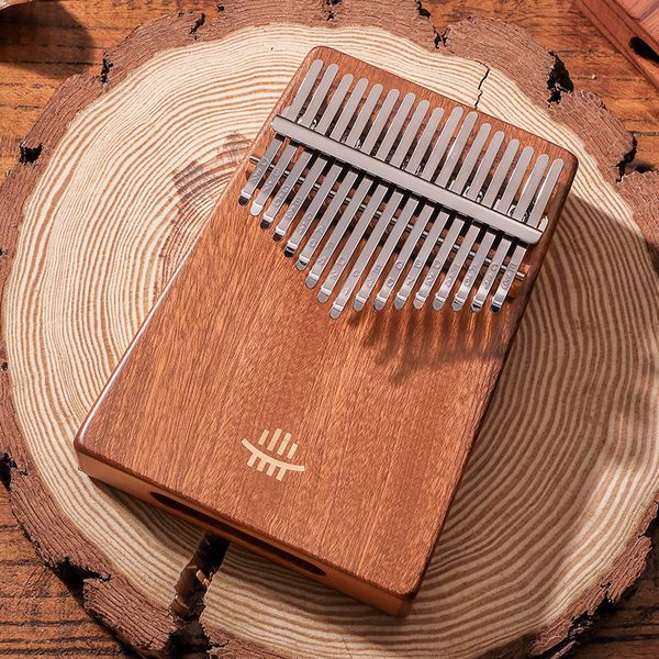 17-key thumb piano kalimba finger piano bottom perforated ebony portable instrument suitable for gifts
17-key thumb piano kalimba finger piano bottom perforated ebony portable instrument suitable for gifts