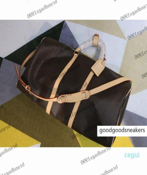 55cm 50cm 45cm classical fashion bags men traveling bag genuine leather trim luggage duffel bag with lock canvas handbag 4681859
55cm 50cm 45cm classical fashion bags men traveling bag genuine leather trim luggage duffel bag with lock canvas handbag 4681859
