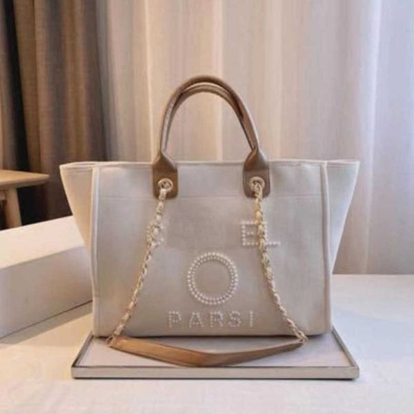brand luxury women's hand bags beach bag embroidered handbag canvas chain backpack evening handbags female pearl big shopping designer
brand luxury women's hand bags beach bag embroidered handbag canvas chain backpack evening handbags female pearl big shopping designer