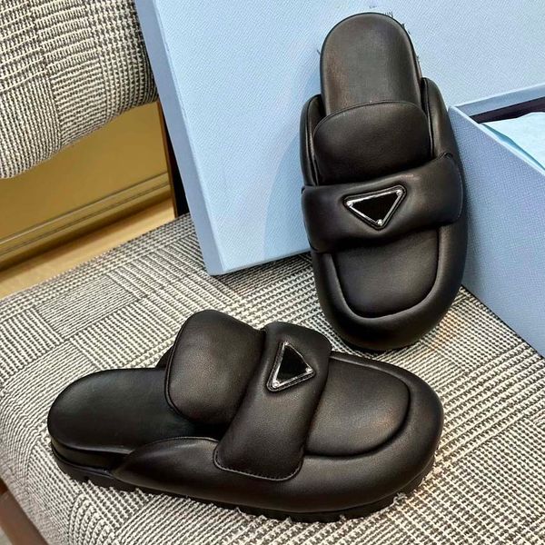 slippers sandals metal triangle logo leather lining 2 cm rubber sole lumped sole sheepskin platform wrapped in sheepskin, Black
slippers sandals metal triangle logo leather lining 2 cm rubber sole lumped sole sheepskin platform wrapped in sheepskin, Black
