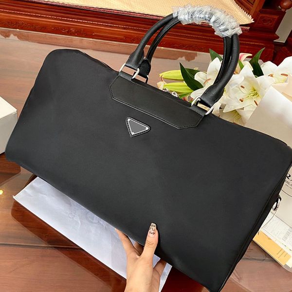 2023 designer bag big traveling bag men's huge duffle large capacity triangle mark nylon available for men and women fashion trend new
2023 designer bag big traveling bag men's huge duffle large capacity triangle mark nylon available for men and women fashion trend new