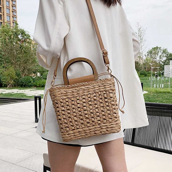 summer women tote bags designer handbags purses weave drawstring closure wooden handle beach shoulder bag 230424
summer women tote bags designer handbags purses weave drawstring closure wooden handle beach shoulder bag 230424