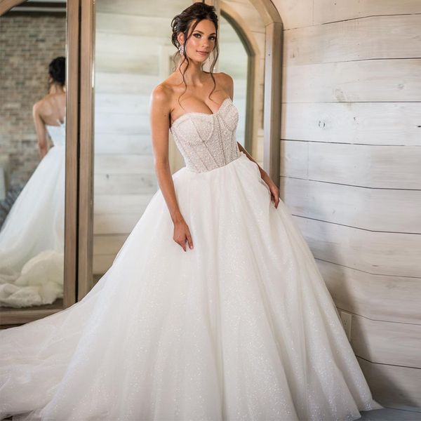 stunning sweethart ball grown wedding dresses bead glitter tulle bridal dress sleeveless princess custom made rode de morrie, White
stunning sweethart ball grown wedding dresses bead glitter tulle bridal dress sleeveless princess custom made rode de morrie, White