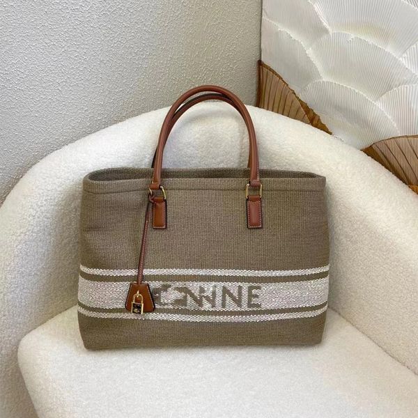 fabric bucket bag shopping bag woven french high-grade beach portable lock head bag
fabric bucket bag shopping bag woven french high-grade beach portable lock head bag