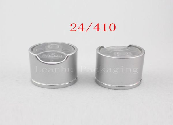 silver disc caps with aluminum collar 24410 aluminum shampoo capplastic bottle cap push pull press caps7781374 
silver disc caps with aluminum collar 24410 aluminum shampoo capplastic bottle cap push pull press caps7781374