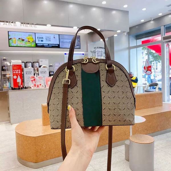 2023 luxury messenger bags womens shell handbagdesigner classic red and green shoulder european american fashion contrast color portable bag, Black;red
2023 luxury messenger bags womens shell handbagdesigner classic red and green shoulder european american fashion contrast color portable bag, Black;red