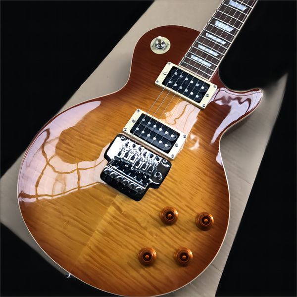 electric guitar with rosewood fingerboard, cream binding, dual vibrato bridge, smoke explosion flame maple chrome hardware
electric guitar with rosewood fingerboard, cream binding, dual vibrato bridge, smoke explosion flame maple chrome hardware