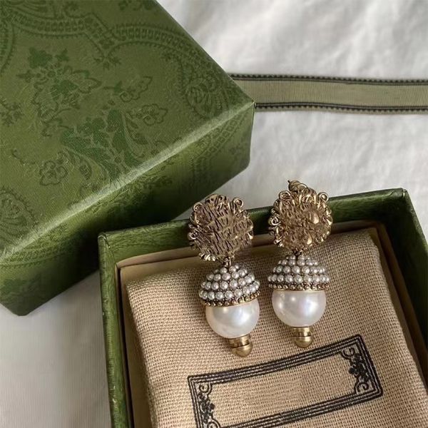 fashion luxury designer lion pearl earrings women's pearl pendant earrings, Golden
fashion luxury designer lion pearl earrings women's pearl pendant earrings, Golden