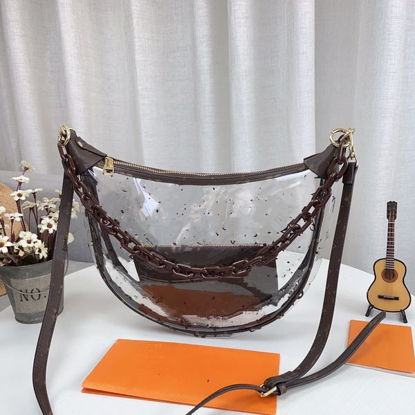 l loop shoulder hobo bag women designer handbag purse croissant chain crossbody bags over the moon underarm transparent jelly pvc tote bag l
l loop shoulder hobo bag women designer handbag purse croissant chain crossbody bags over the moon underarm transparent jelly pvc tote bag l