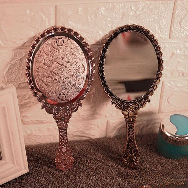 makeup tools creative retro carving hand-held vanity mirror female handle makeup mirror portable small round mirror makeup tools j230601
makeup tools creative retro carving hand-held vanity mirror female handle makeup mirror portable small round mirror makeup tools j230601