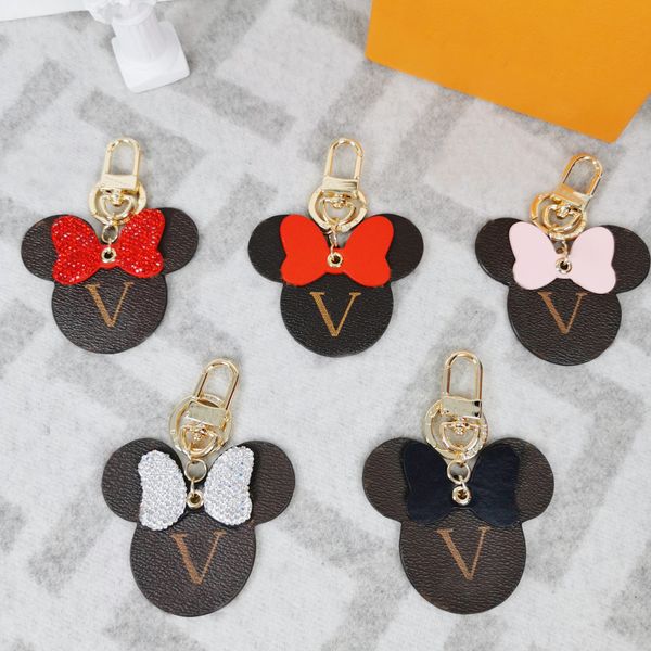 mouse pu keychain brand classic flower designer mens luxury car keyring bowknot womens fibbia keychains handmade fashion keychain bags v pen, Silver
mouse pu keychain brand classic flower designer mens luxury car keyring bowknot womens fibbia keychains handmade fashion keychain bags v pen, Silver